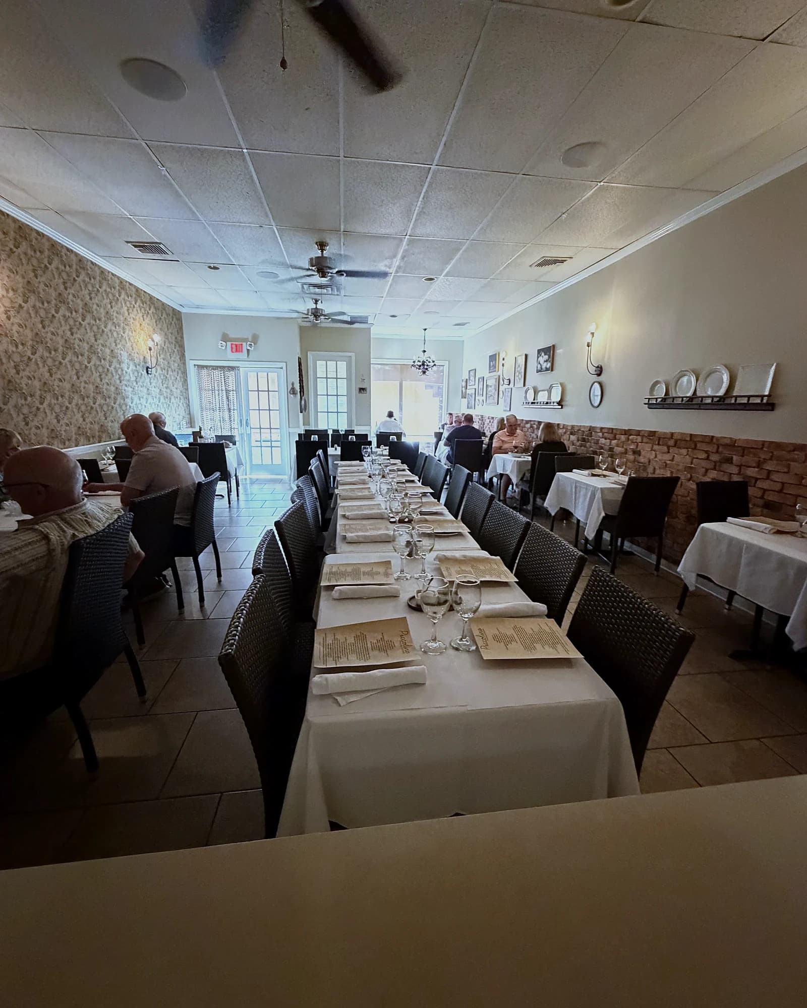 A long table set for a party at Piccolino